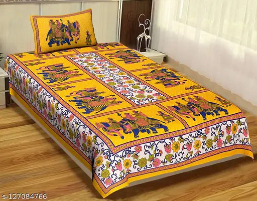Yellow 100% cotton UniqChoice Jaipuri single bedsheet with pillow cover, floral design on a regular quality sheet