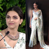 White floral lehenga saree, embellished with jeweled neckline and earrings