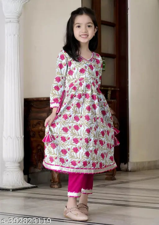 Pink rayon ethnic floral top with three-quarter sleeves, printed pattern on front. Girls' party wear from India, suitable for ages 5-12 years