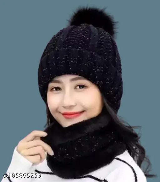 Woolen winter cap, black with a pompom detail