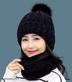Woolen winter cap, black with a pompom detail