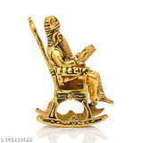 Stylish metal Ganesha idol with chair, Indian handcrafted figurine on a plain background