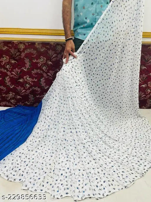 Georgette print saree, intricate details on blue fabric