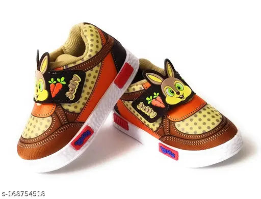 Black and brown jelly shoes with colorful polka dots, velcro closure