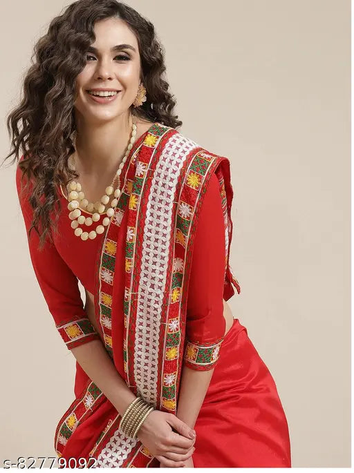 Multi-colored Vichitra silk saree with embroidered blouse, Indian Kutchi embroidery on traditional attire