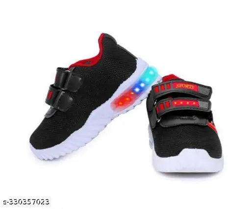 Black and red children's running shoes with neon lights