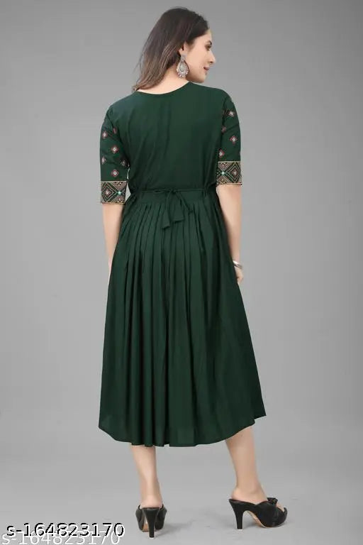 Green Rayon Victoriya Kurti with embroidered pattern, perfect for functions, festivals, parties, or weddings. Indian-origin, stylish and comfortable