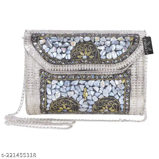 Silver metal clutch purse with tassel and chain strap, embellished with blue ombre beads and a patterned inset