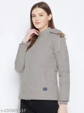 Grey polyester women's parka jacket, Vero Amore brand. Solid design with quilted fill, detachable faux fur hood, and three pockets (one internal)