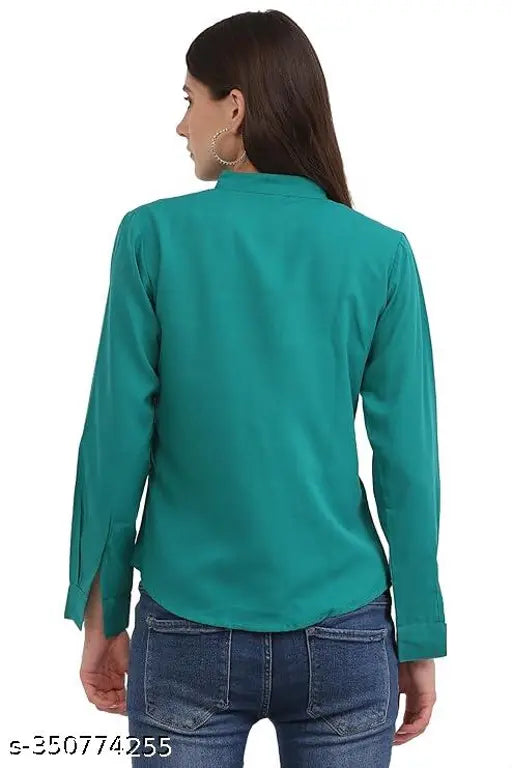 Jade green poly crepe formal top with notched neckline and full cuff sleeves for women, solid pattern on display
