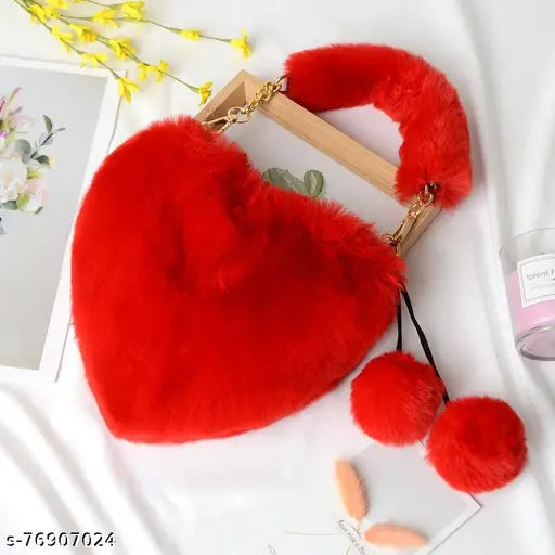 Red faux fur heart shaped handbag with a chain strap and metal hardware