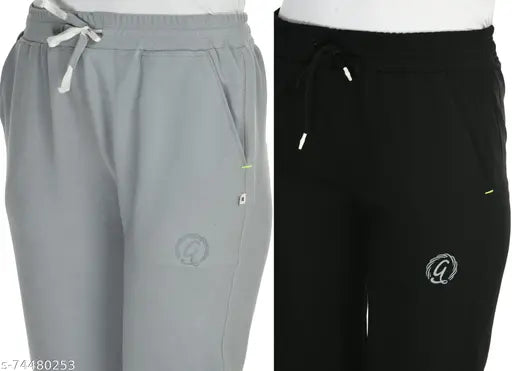 Grey trackpants, black drawstring, logo on left leg