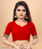 Red georgette saree with gold borders and embroidery