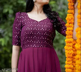 Maroon lace kameez with a flared skirt