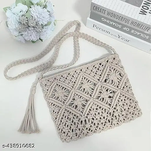 Handcrafted boho macramé crochet purse, featuring a tassel and suitable for summer and beach outings. Crossbody design