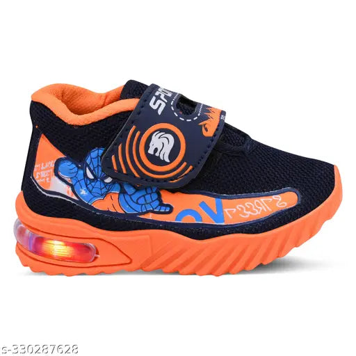 Orange and black casual sneaker for kids, featuring a playful design with an LED light on the sole