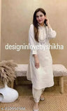 Rayon embroidered net kurta set with palazzos, three-quarter sleeves - Indian women's fashion