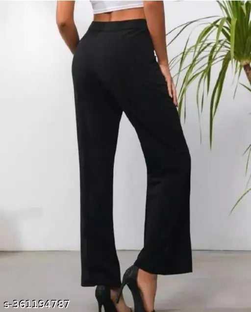 Black high-waisted flared pants with visible pockets