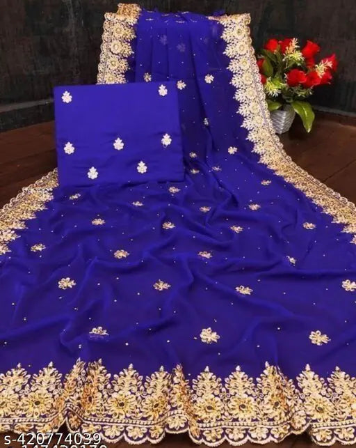Embroidered traditional Indian saree, rich blue silk with golden zari border and pallu