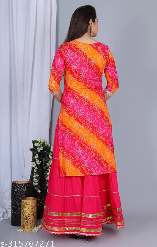 Bright orange kurta, skirt with dupatta, traditional Indian attire