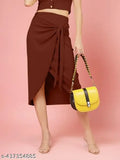 Brown ribbed wraparound skirt with a high waist, mid-length, and a yellow clutch
