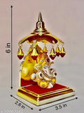 Multicolor handcrafted polyresin Ganesha idol for home decor and car dashboard, ideal for living room showpieces