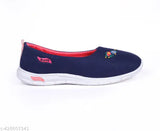 Dark blue velvet loafer with pink soles and red flower embroidered on heel