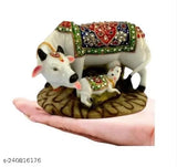 Multi-colored Polyresin Kamdhenu Cow and Calf Statue, symbolizing prosperity and love. Perfect for home decor or gifting occasions. Made in India