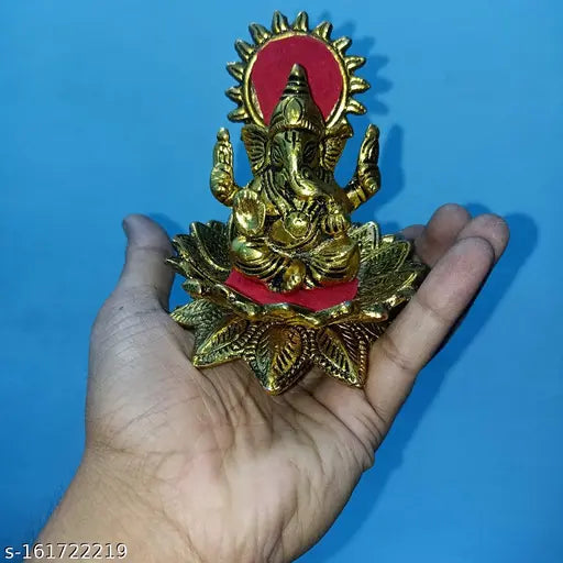 Heavy metal Ganesh statue with red accents