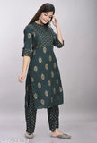 Stylish rayon women's kurta and palazzo set with three-quarter sleeves, printed net pattern. Rayon fabric for lightweight, comfortable wear for functions, festivals, parties, weddings in India