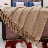 Beige cotton fringed throw blanket on sofa, 150cm x 125cm