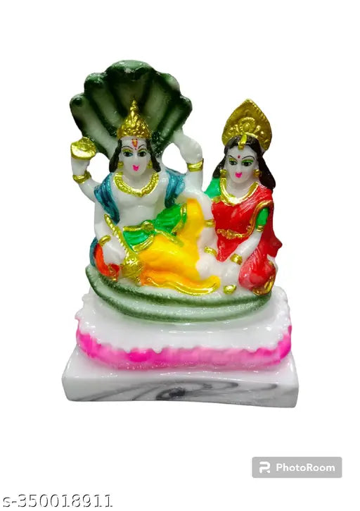 Golden religious idol, Lord Vishnu and Maa Laxmi with green snake, intricate details