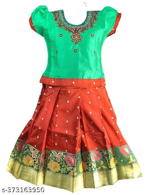 Designer silk lehenga-choli and pattu pavadai set, embroidered with zari stitch, suitable for kids parties and traditional occasions in India