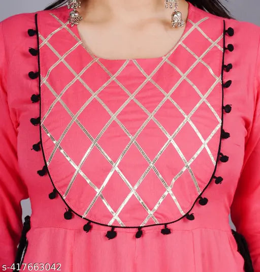Pink rayon printed maternity dress with intricate detailing and lace trim