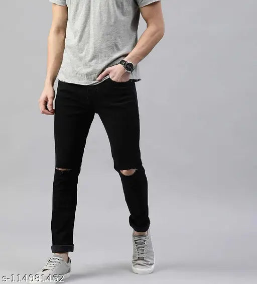 Men's black denim knee-cut jeans, solid print with no fade and buttons/zip closure. Size 28, 30, 32, or 34 inches waist. Made in India