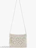 Handcrafted macramé crossbody sling bag, off-white color with a fringe detail