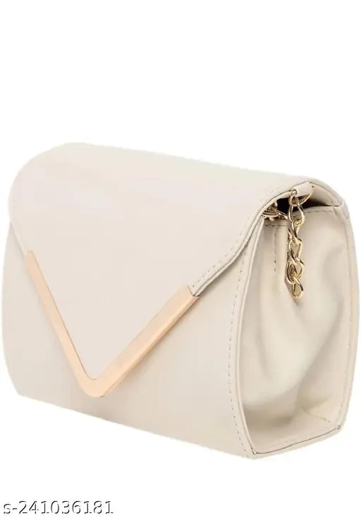 White leather sling bag, with gold chain detail and flap closure
