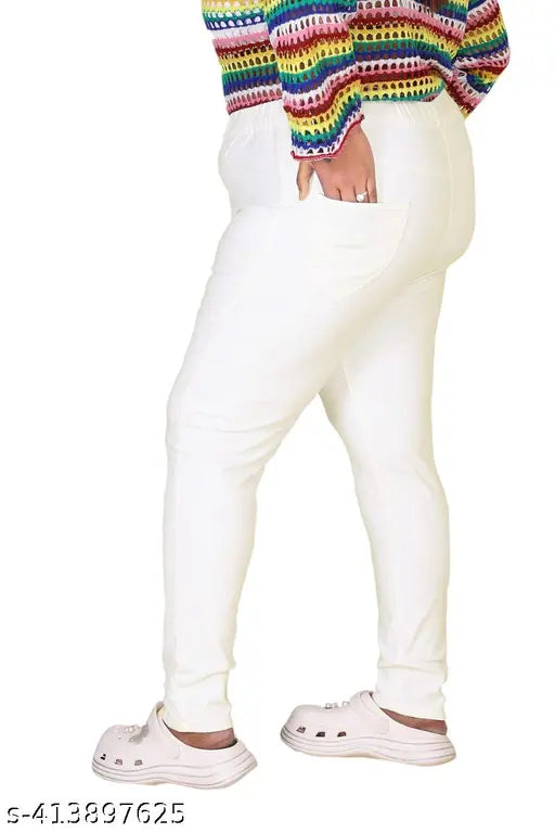 Plus-size denim jeggings in solid white. High-quality stretchable Lycra fabric for comfort. Elastic waistband and full-length design. Available in sizes: 5XL, 6XL, 7XL, 8XL, 9XL, 10XL. Made in India