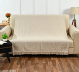 Beige plaid blanket with fringe for couch, soft texture, cozy addition