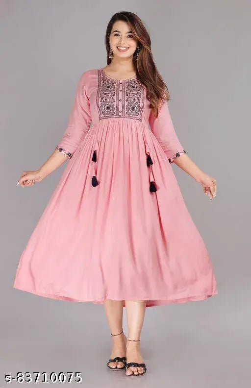 Pink long dress, embroidered with intricate designs