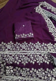 Purple georgette fabric saree with intricate cut work and border embroidery