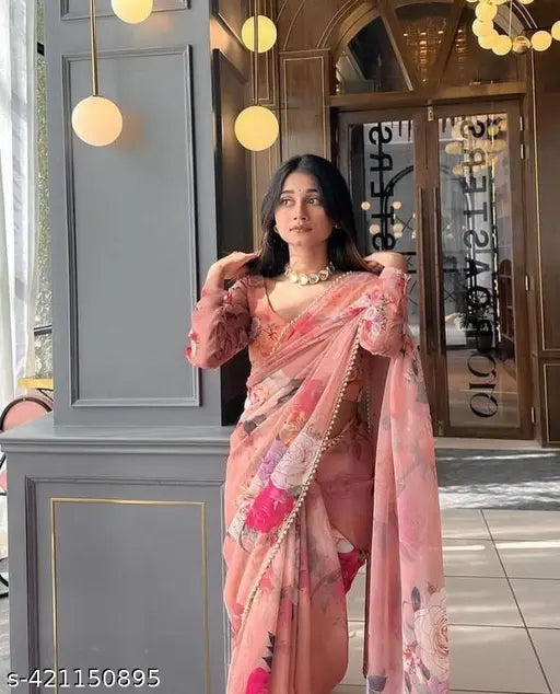 Soft light-weight Georgette saree with fancy pearl lace border & printed running blouse in eye-catching color combination. Indian-origin Abhisarika Ensemble Sarees