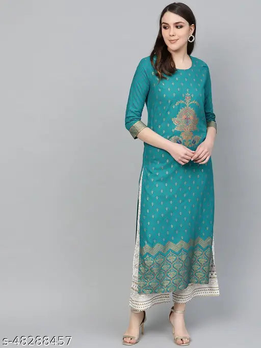 Green rayon kurta with gold print and white plazo bottomwear. Traditional Indian festival wear, perfect for special occasions. Machine washable