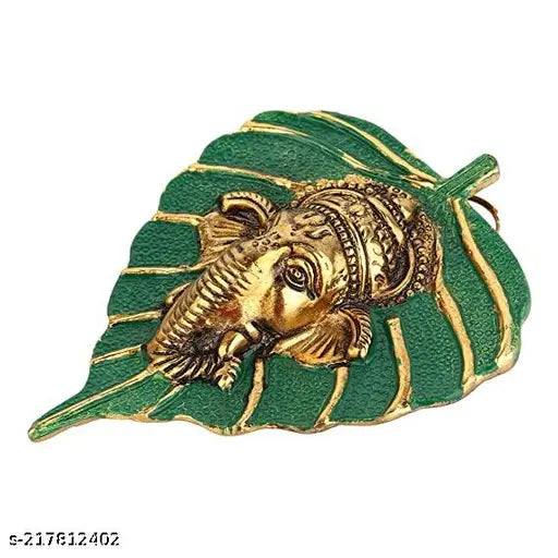 Green Metal Finish Peepal Leaf Ganesh Idol: Handcrafted Indian wall hanging, traditional styling, gold plated with antique finish