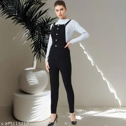 High-waist black denim dungaree for women, sleeveless with adjustable shoulder straps and metallic button closures