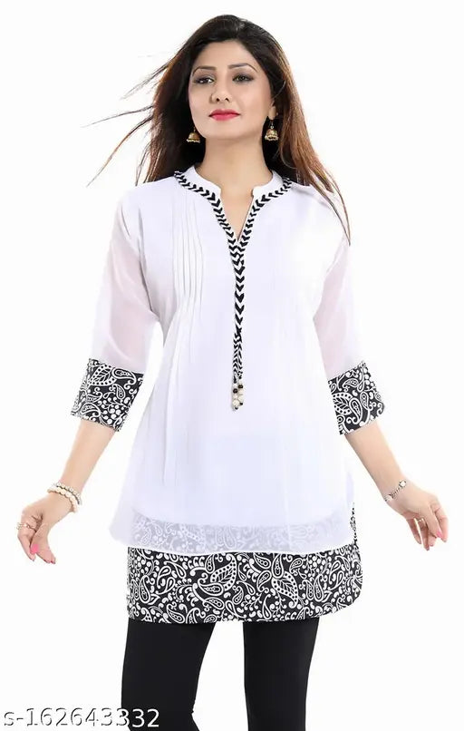 White/Black printed georgette kurta with three-quarter sleeves and a self-designed pattern. Meher Impex women's fashion on display