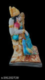 Marble Saraswati Mata religious figurine, serene Hindu goddess symbolizing learning and creativity on table