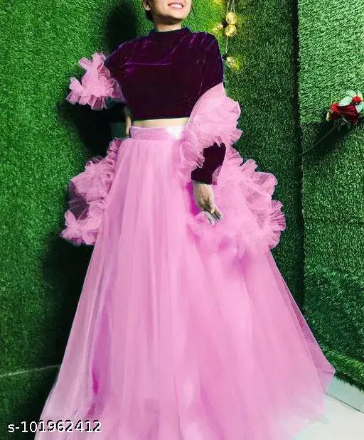 Stylish velvet lehenga-dupatta set with ruffled top and solid net bottom, semi-stitched. Indian designer fashion for traditional events