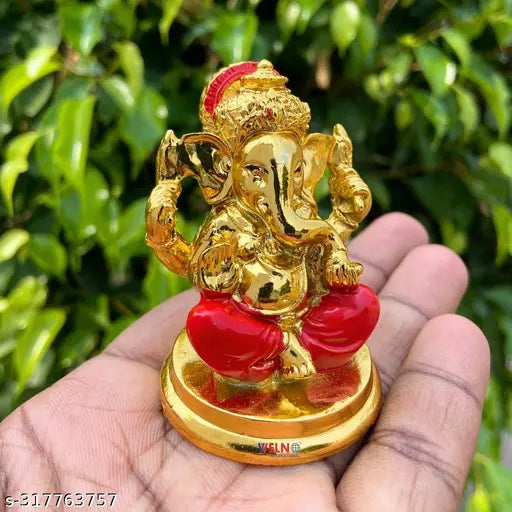Pure golden finish Ganesha with red dhoti for car dashboard - Indian spiritual & festive décor item