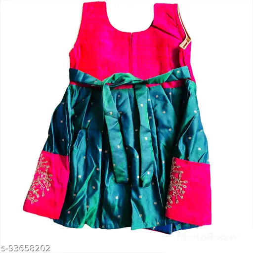 Red and green embellished party dress with a draped front, short sleeves, fitted waist